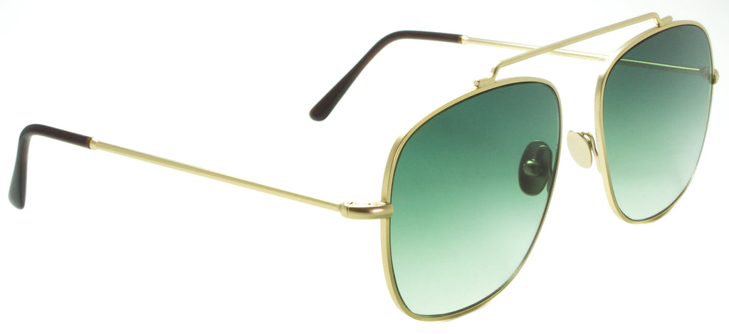 Spektre Montana-MO02DFT-Gold . Side view. Handmade in Italy in stainless steel. Designer sunglasses available exclusively at Edward Beiner Boutiques.